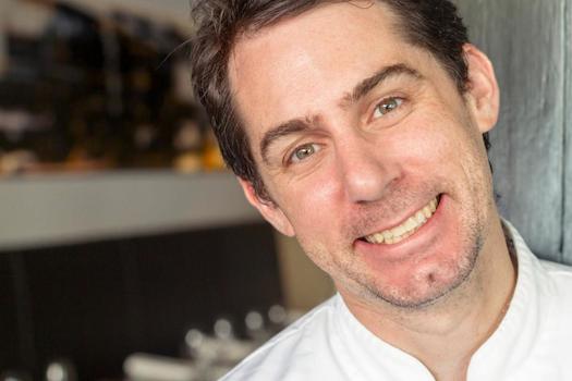 Paul Cooper thinks that more chefs should smile...even if they don't do it in the kitchen