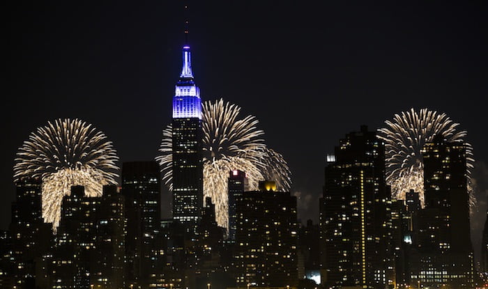 Fireworks light up the Empire State Building along the Manhattan skyline during Macy's 37th Annual Fourth of July fireworks show, Thursday, July 4, 2013, in New York. (AP Photo/John Minchillo)