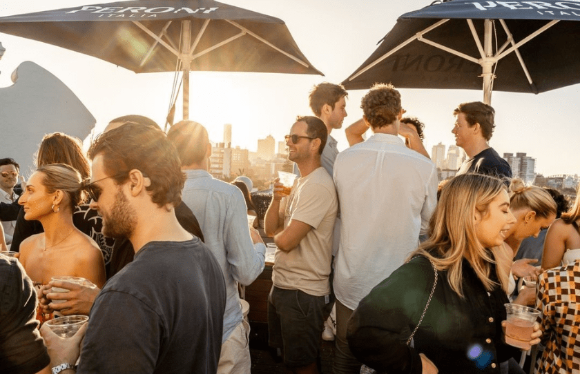 Crowd of people outside drinking and socialising a Paddington's Royal Hotel