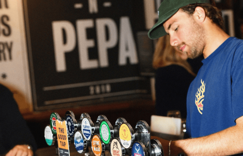 The Royal Bondi bartender pouring a drink