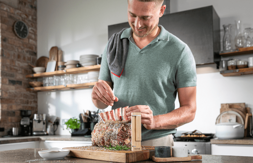 Dad using meater 2 to cook in the kitchen - father's Day guide 2024