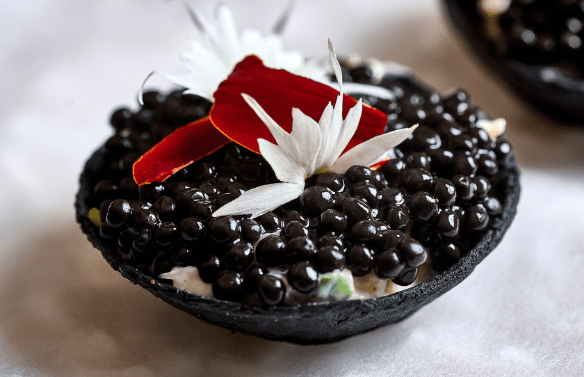 Image of the dish with Prawn and black Caviar