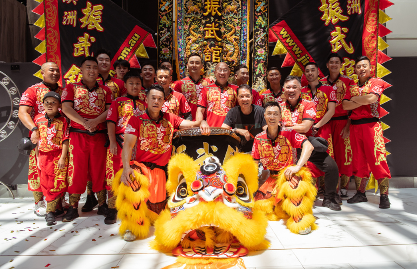 Acrobats with lion mask and chinese art for Market City's Moon Festival celebrations