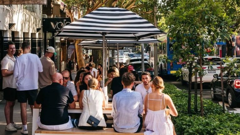 Sydney scraps no standing rules at bars, and they’re celebrating with cheap drinks